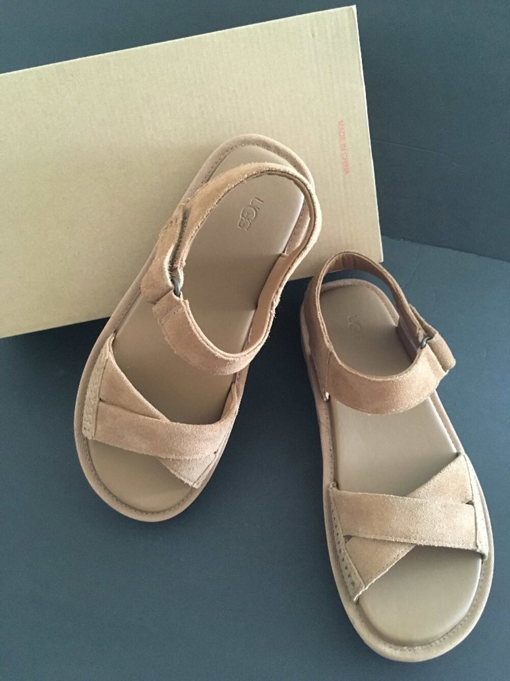 NWT. UGG Sungaze Platform Sandal. Leather. Color: Sand. Sz 9. Made in Cambodia.